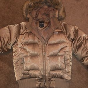 Gold north face puffer jacket